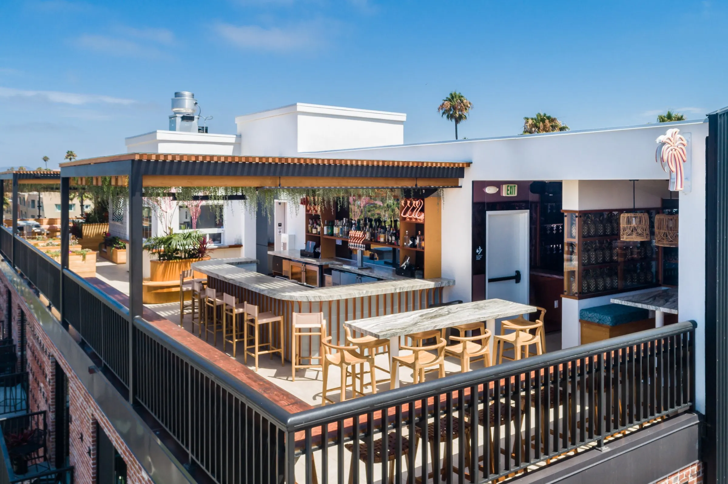 Aerial view of Coco Cabana rooftop bar — COCOCABANA sign on The Brick Hotel, Downtown Oceanside
